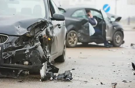 black cars crashed into each other